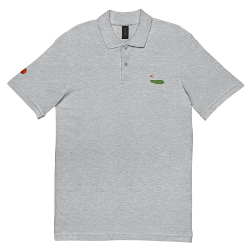 Polo de golf gris brodat amb green – Tot Queda en Família